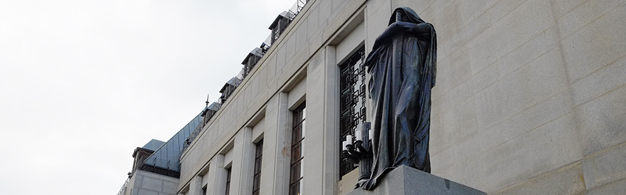 Statute Justicia in front of the Supreme Court of Canada Building